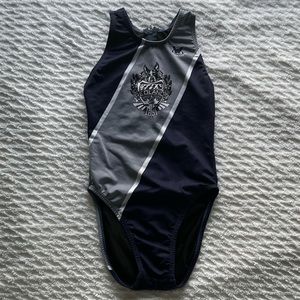 Three one piece water sport suits